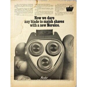 Norelco Electric Shaver "Now we dare any blade to match Shaves"Vtg Print Ad 1968